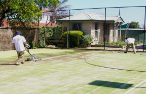 Removing algae by power rinsing
