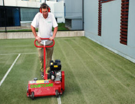 Lifting flat turf and loosening compacted sand base